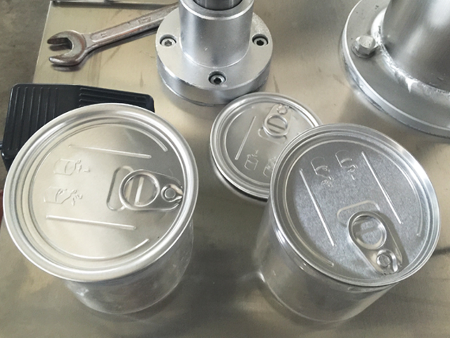 metal qutuların qapaqlanması maşını.jpg