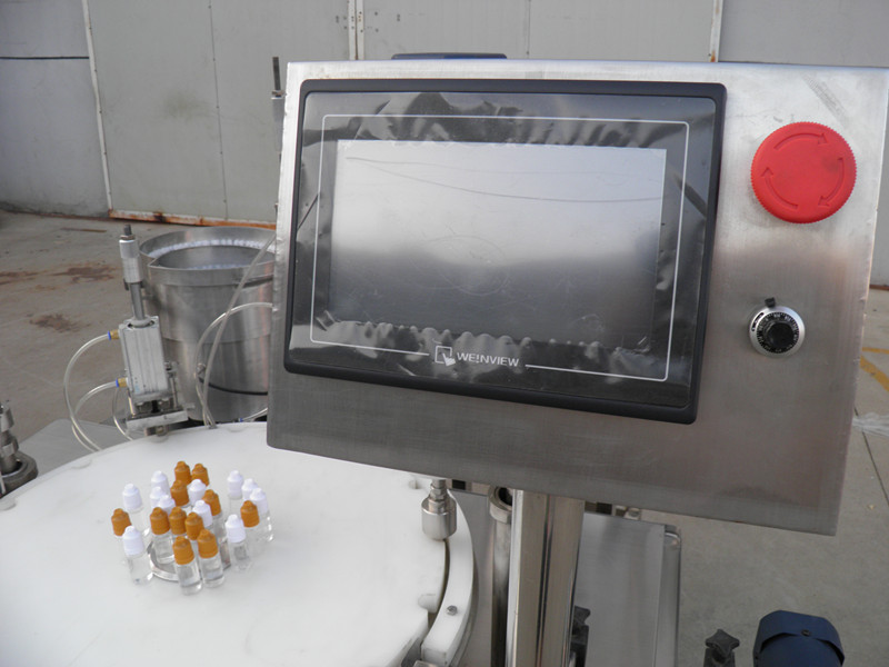 filling plugging capping labeling production line E maye PLC şüşə doldurucu qapağı etiketləmə.jpg