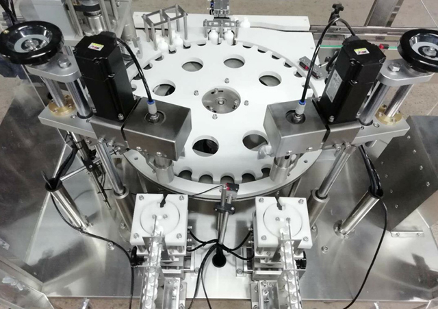 şüşə robot qolu qidalandırıcı.jpg