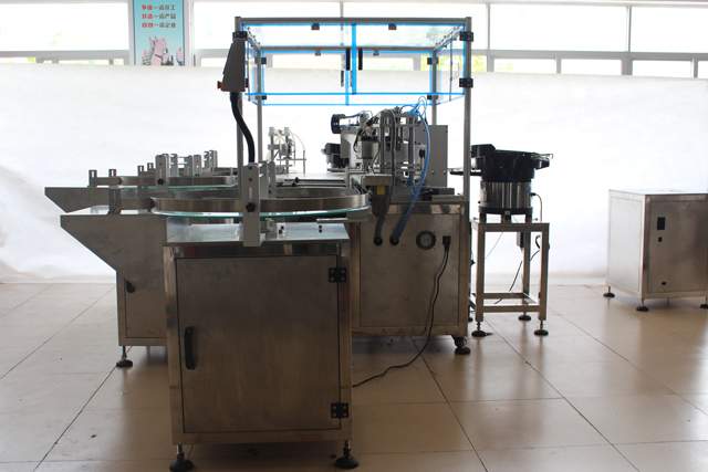 doldurma qapaqlı efir yağı maşını.jpg