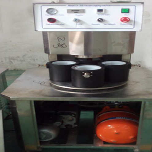illustration of vacuum capping machine semi automatic vakuum qapağı üçün illüstrasiya.jpg