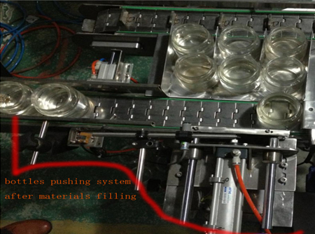 automatic bottles pushing system after filing şüşə itələmə sistemi.jpg